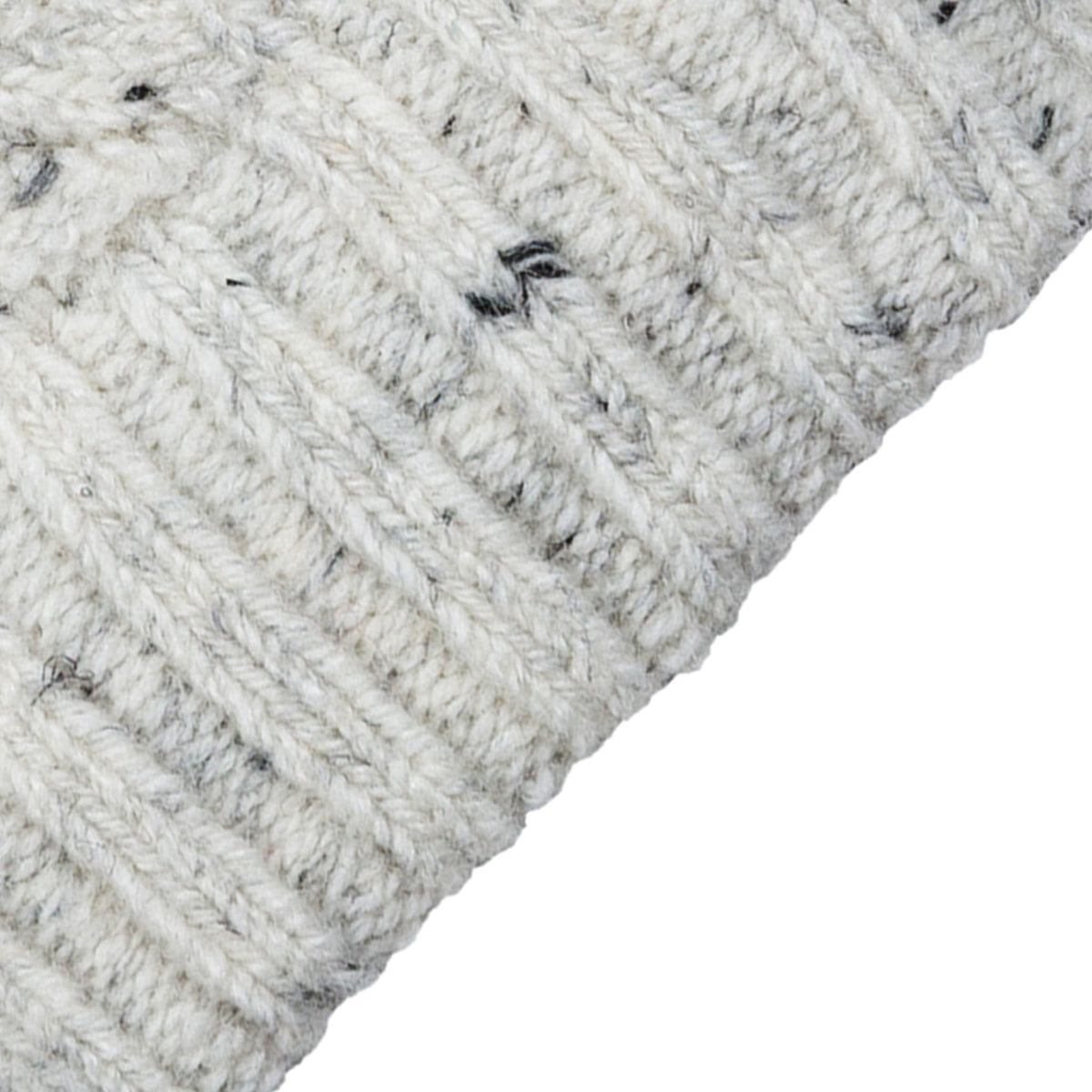 Women's lace knit gloves with marl yarn in white, cuff close up.