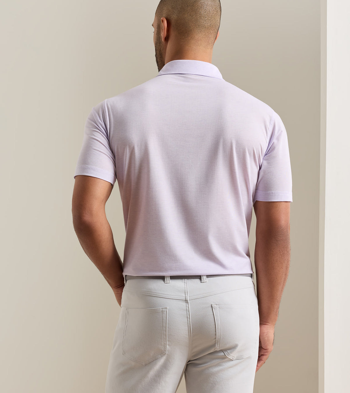 Peter Millar ETC Performance Jersey Polo in Garden Violet - model rear view