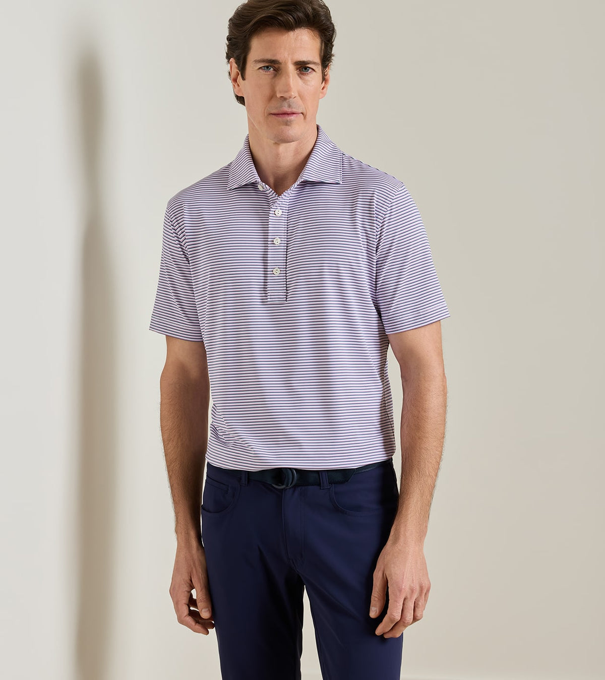 Peter Millar Rondo Performance Jersey Polo in White / Cadet - model front view