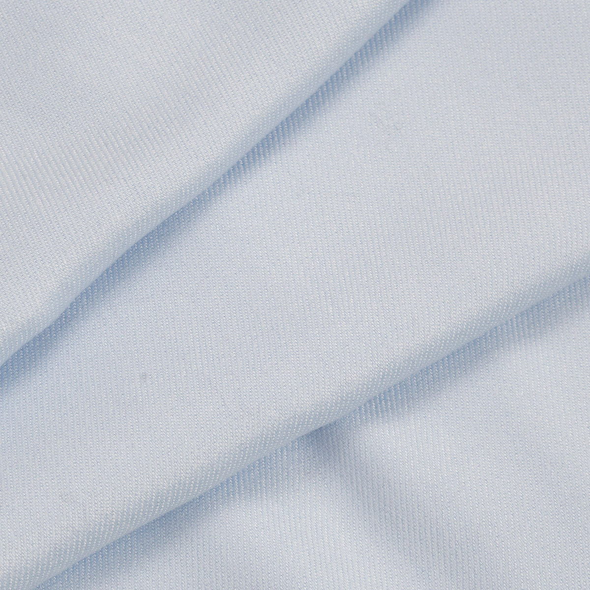 Close up of women's plain pashmina shawl in pale blue