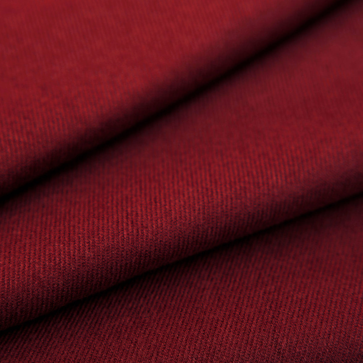 Close up of women's plain pashmina shawl in burgundy