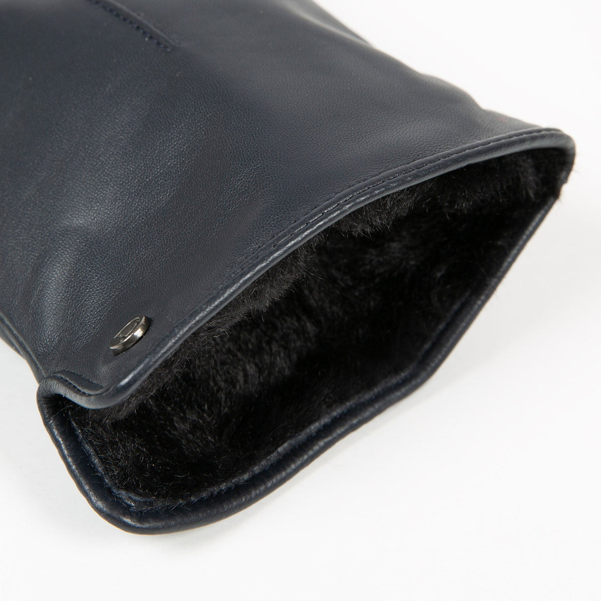 Women's touchscreen single-point faux fur lined leather gloves in navy open cuff