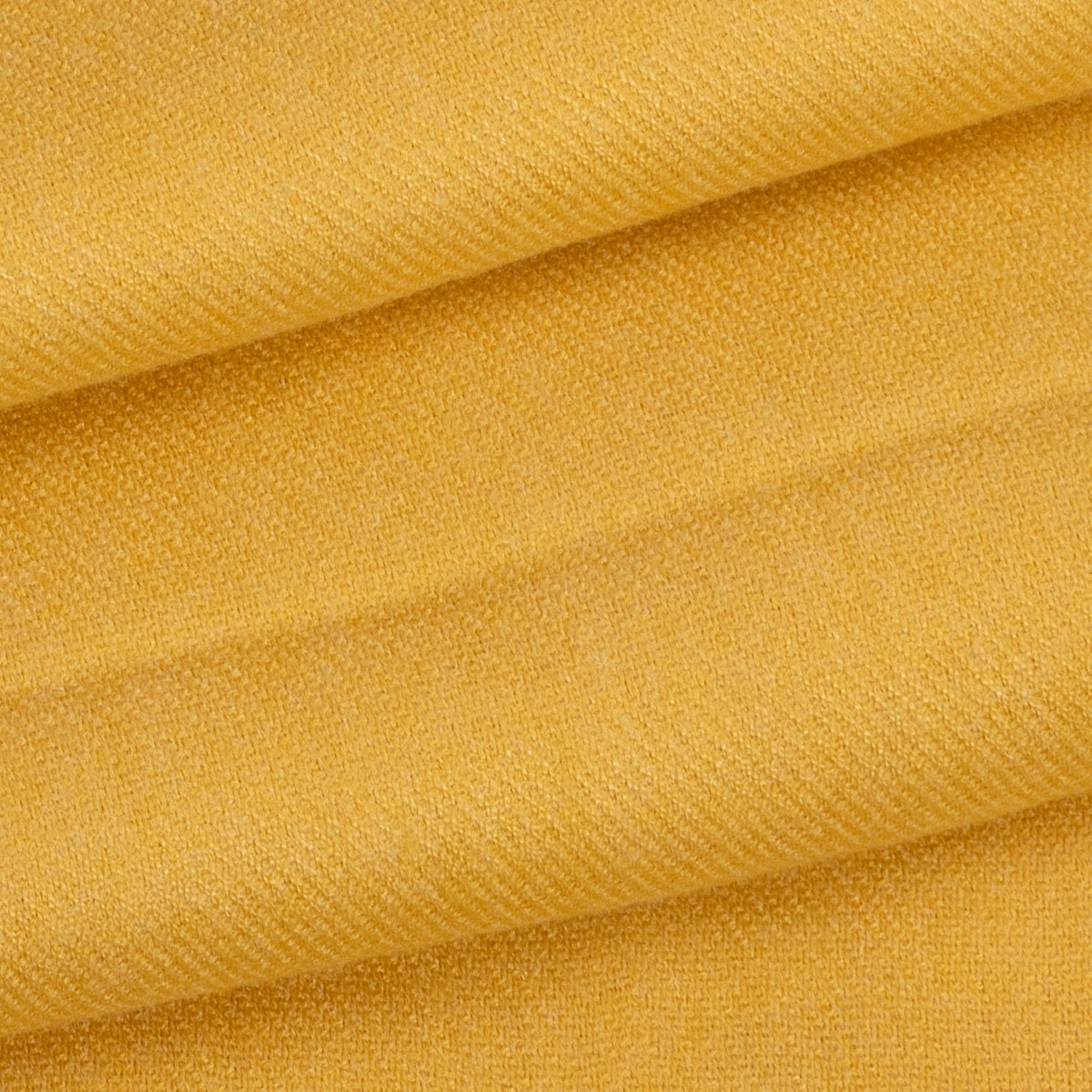 Close up of women's pashmina shawl in yellow