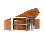 Men’s heritage reversible full-grain leather belt with satin nickel buckle in black/tan, loop position. 