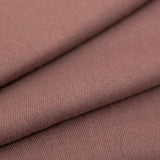 Women's plain pashmina shawl in brown close up of fabric.