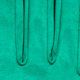 Women's long satin opera gloves in green, fingers close up. 