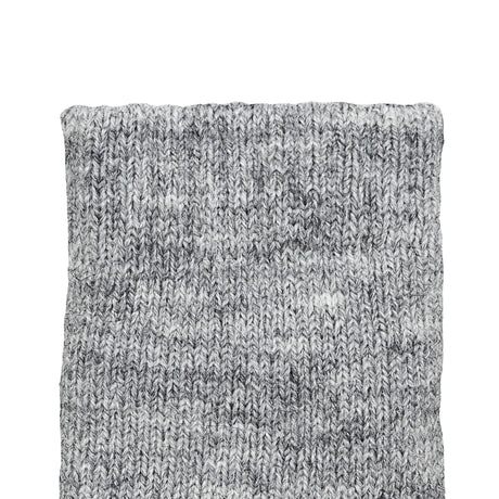 Women's cable knit gloves in light grey, left hand close up. 