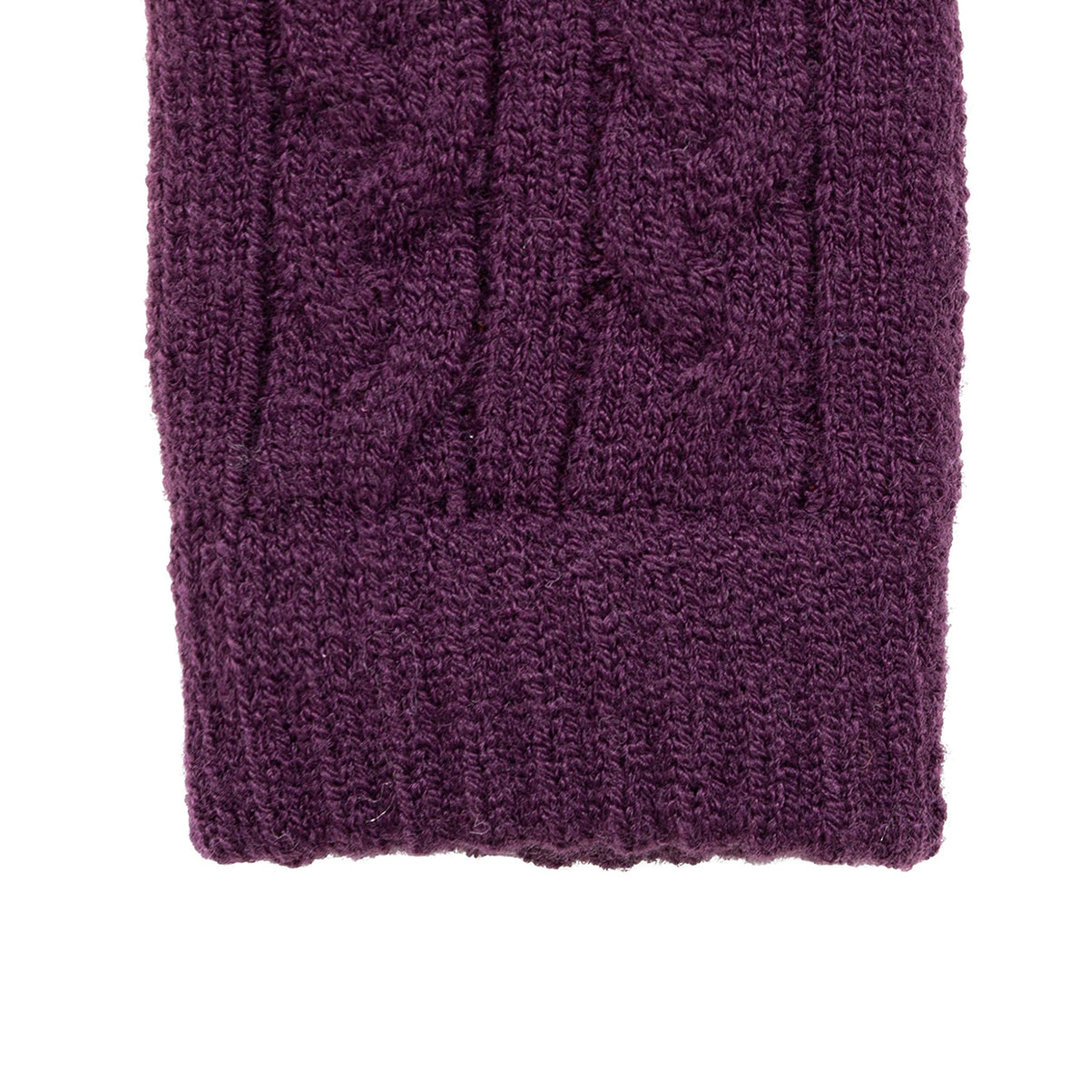 Women's cable knit gloves in purple, right hand close up. 