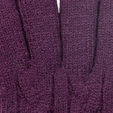 Women's cable knit gloves in purple, fingers close up. 