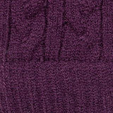 Women's cable knit gloves in purple, fabric close up. 