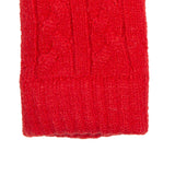 Women's cable knit gloves in red, right hand close up. 