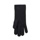 Women's cable knit gloves in black, left hand. 