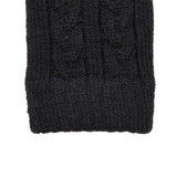 Women's cable knit gloves in black, right hand close up. 