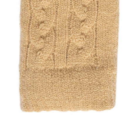 Women's cable knit gloves in beige, right hand close up. 