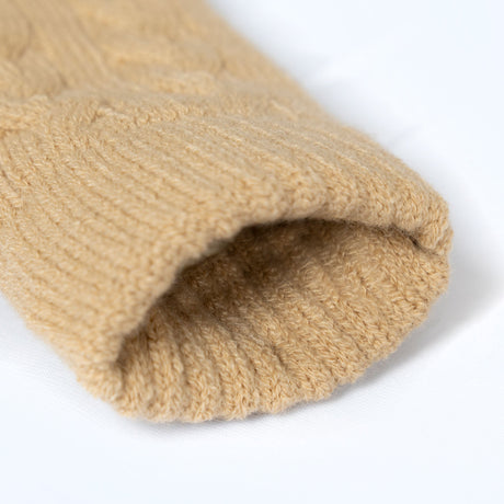 Women's cable knit gloves in beige, open cuff.