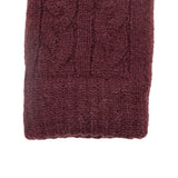 Women's cable knit gloves in burgundy, right hand close up. 
