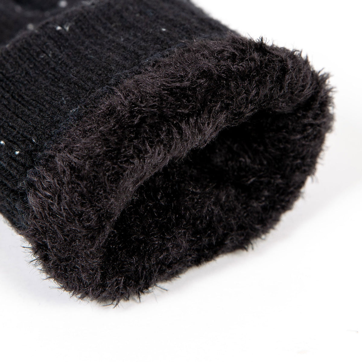 Women's lace knit gloves with marl yarn in black, cuff.
