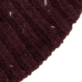 Women's lace knit gloves with marl yarn in burgundy, cuff close up.