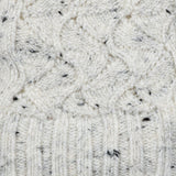 Women's lace knit gloves with marl yarn in white, fabric close up.