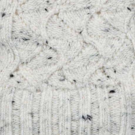 Women's lace knit gloves with marl yarn in white, fabric close up.