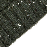 Women's lace knit gloves with marl yarn in green, cuff close up. 