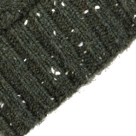 Women's lace knit gloves with marl yarn in green, cuff close up. 
