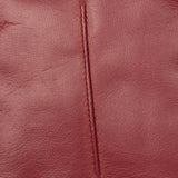 Women's touchscreen single point faux fur lined leather gloves in red, single point.