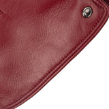 Women's touchscreen single point faux fur lined leather gloves in red, cuff close. 