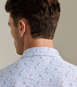 Peter Millar Glassware Performance Jersey Polo in White - fabric detail