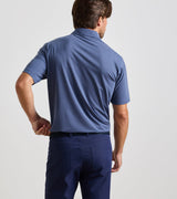 Peter Millar ETC Performance Jersey Polo in Bali Blue - model rear view