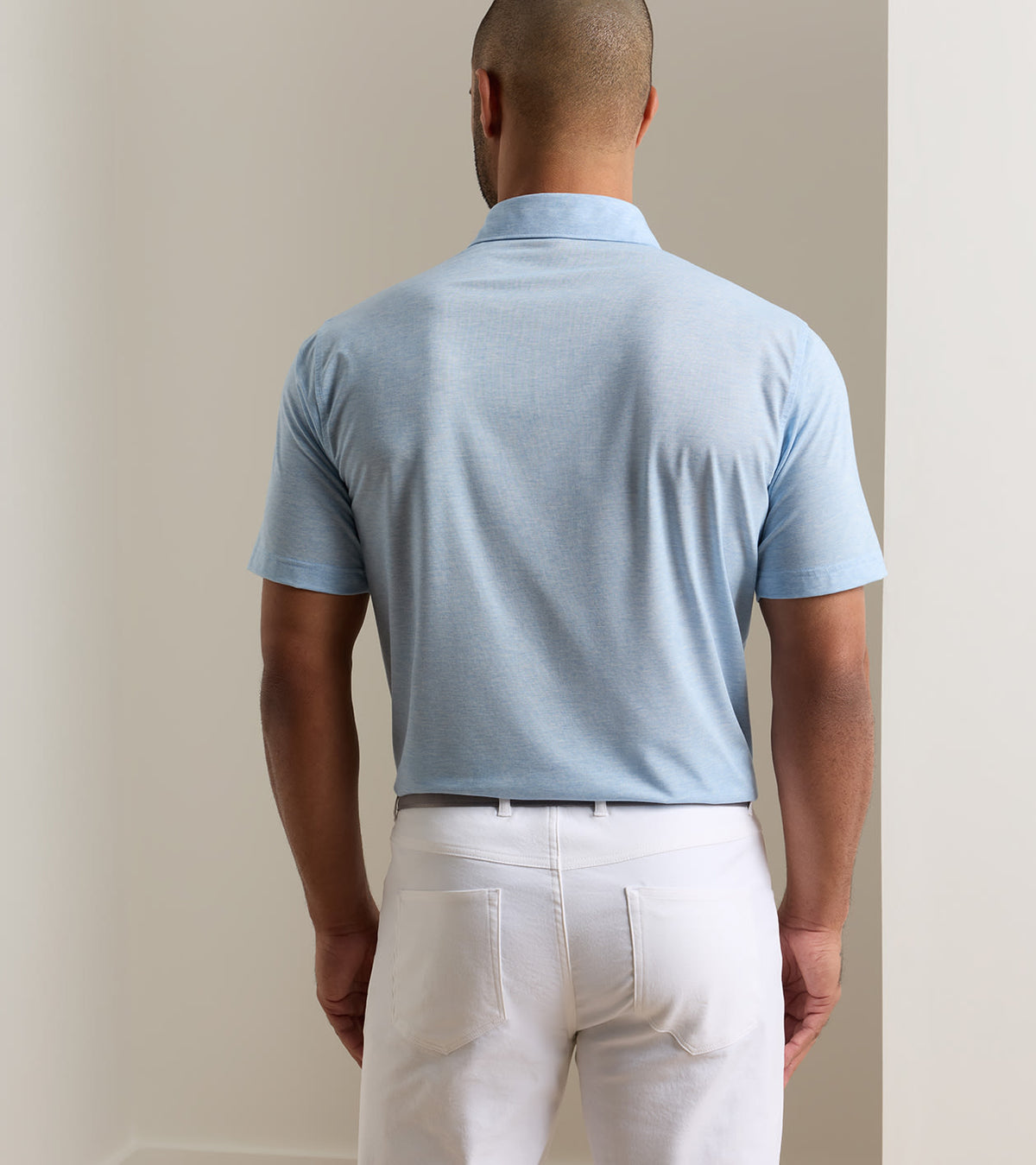 Peter Millar ETC Performance Jersey Polo in Cottage Blue - model rear view