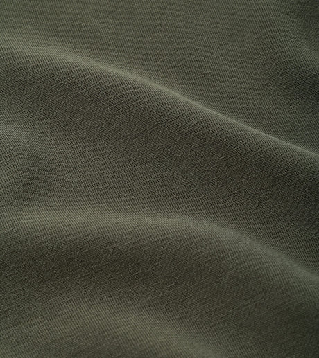 Peter Millar Soft Suede Performance Quarter-Zip in Dark Olive - lifestyle view