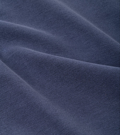 Peter Millar Soft Suede Performance Quarter-Zip in Navy - lifestyle view