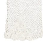 Women's cotton crochet gloves in ecru - close up of the cuff on the back of the hand