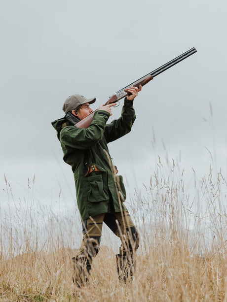 Swazi Wapiti XP Hunting Jacket in Olive, worn during outdoor shooting