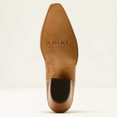 Brown leather boot sole with 'Ariat' branding on a beige background