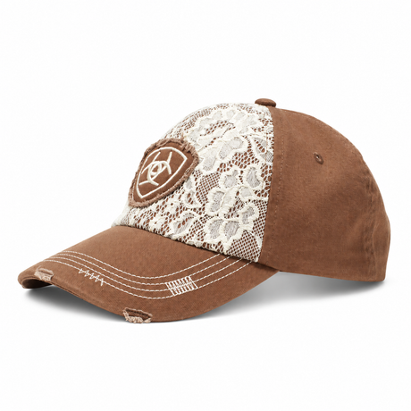 Ariat women's Lace Logo Cap in Brown with ivory lace front and distressed shield logo patch, front three-quarter view