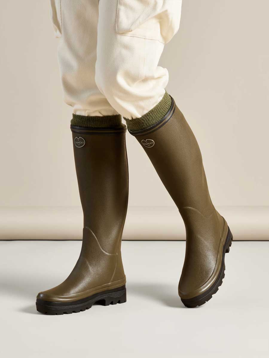 LE CHAMEAU Giverny Wellington Boots - Ladies Wool Lined - Dark Green, worn outdoors