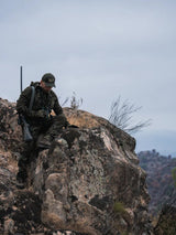SEELAND Chaser Aero Camo Jacket - Mens - InVis MPC Green - hunter resting on rocks
