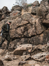 SEELAND Chaser Aero Camo Jacket - Mens - InVis MPC Green - hunter crossing rocky ground