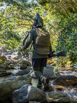SWAZI Buffalo Bag Olive, worn walking through woodland