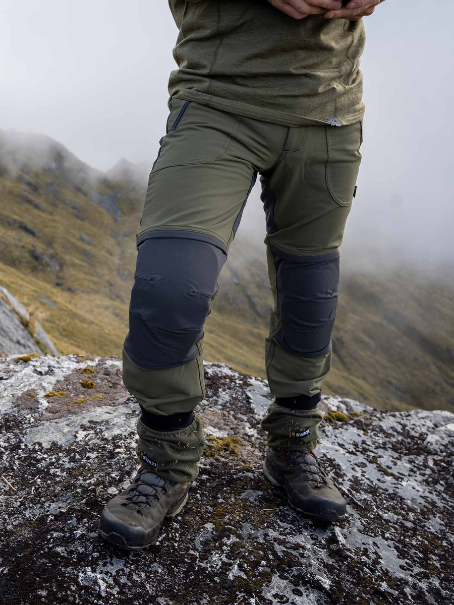 SWAZI Forest Pants III Mens Tussock, worn outdoors on rocky ground