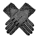 Women's crochet glove in black, crossed position. 