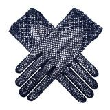 Women's crochet glove in navy, crossed position. 