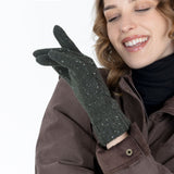Woman wearing green lace knit gloves with marl yarn