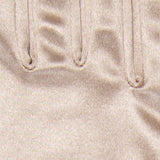 Women's long satin opera gloves in champagne - close up of the inseam stitching between the fingers
