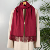 Women's pashmina shawl in burgundy, over a coat