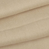 Close up of a folded up women's pashmina shawl in oat
