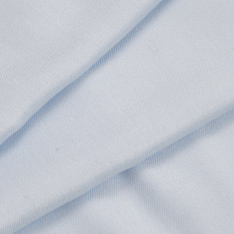 Close up of women's plain pashmina shawl in pale blue