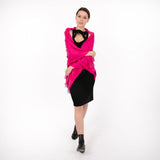 Woman wearing plain pashmina shawl in fuchsia - draped over her shoulders